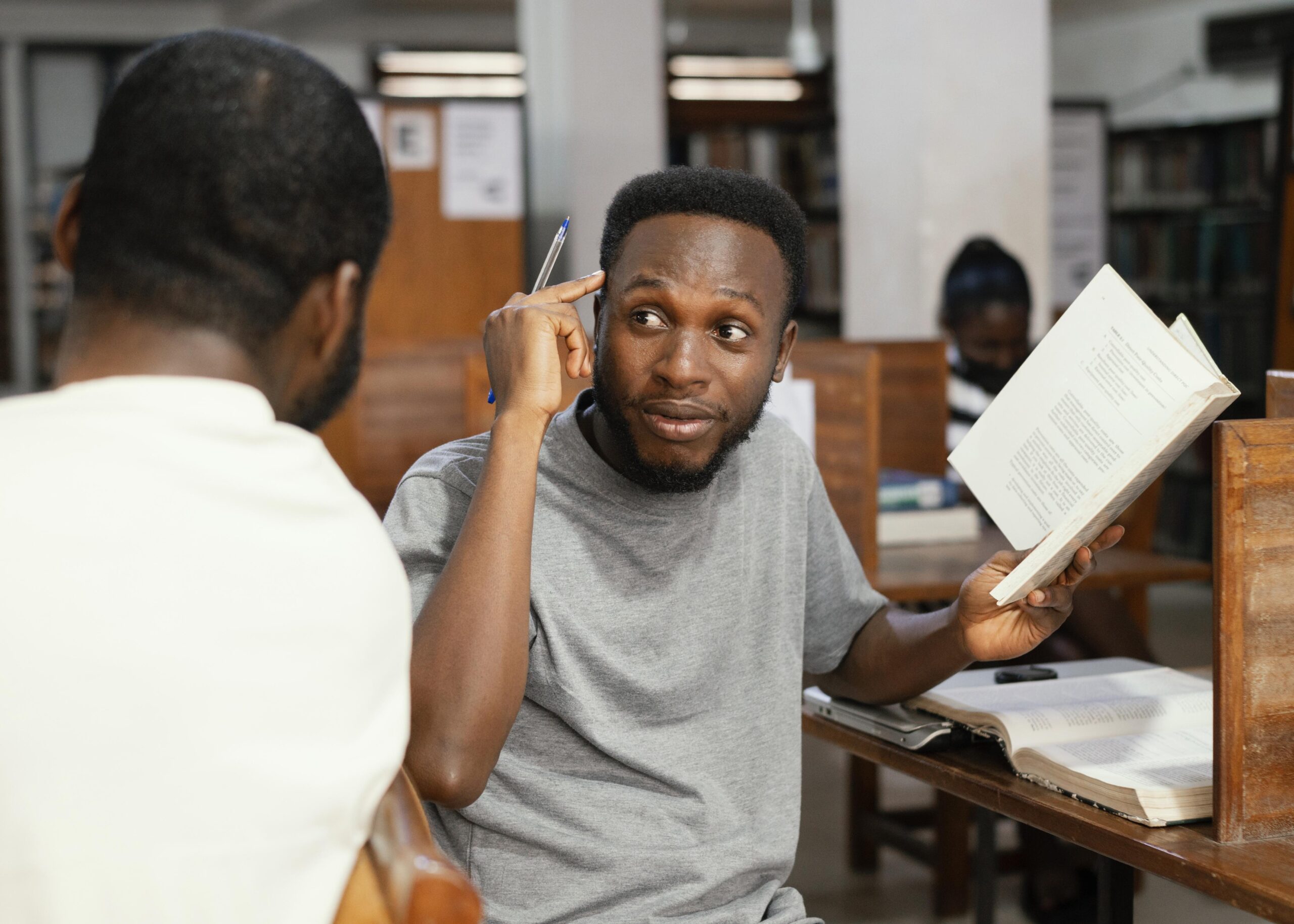 close up students with book library